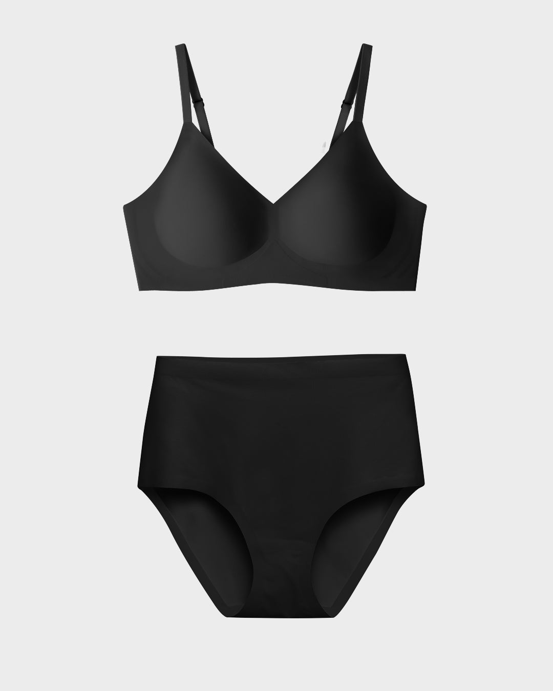 Black relief bra and matching high-waisted panties set in a flat lay.