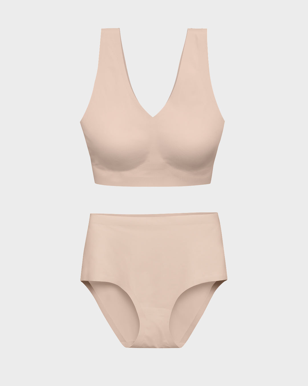 Evening sand wireless bralette and matching high-waisted panties set in a flat lay.