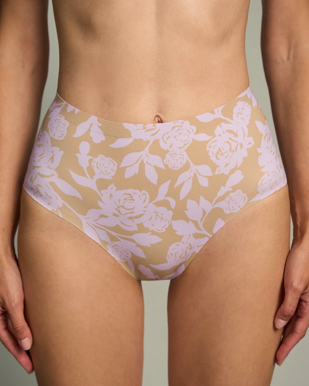 Floral high rise seamless panties shown on model, featuring a no show design for invisible comfort and flattering high waist coverage