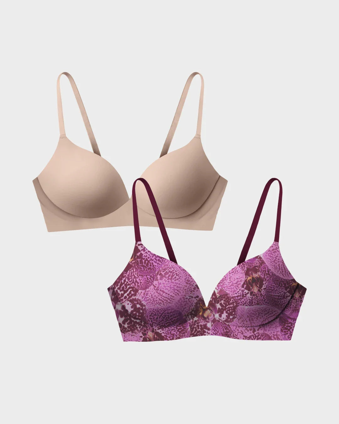 Wireless t-shirt bra two-pack in nude and orchid print in a flat-lay arrangement.