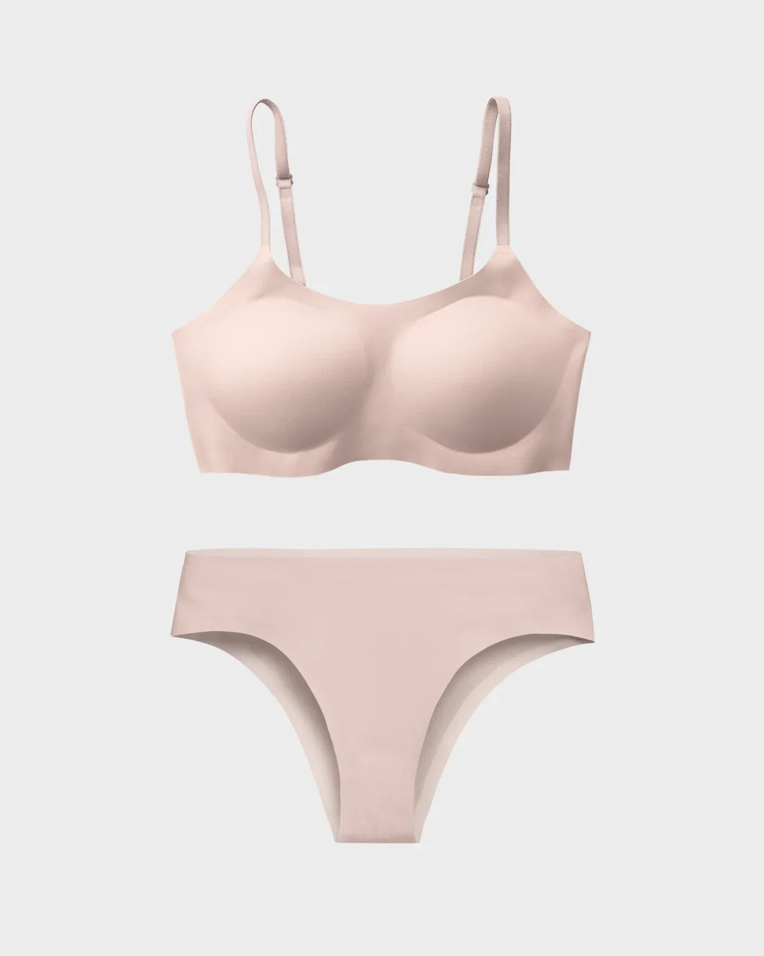Primrose pink support bralette and matching cheeky panties set in a flat lay.
