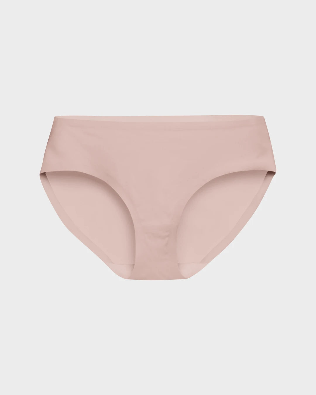Blush pink seamless mid-rise bikini brief with bonded edges laid flat on a light gray background.