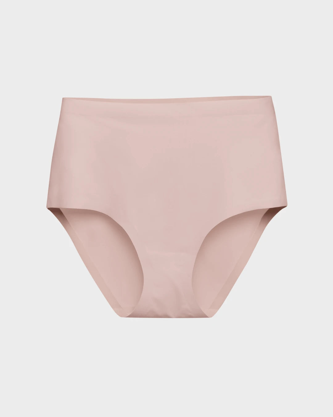 Blush pink seamless high-waisted brief with bonded edges laid flat on a light gray background.